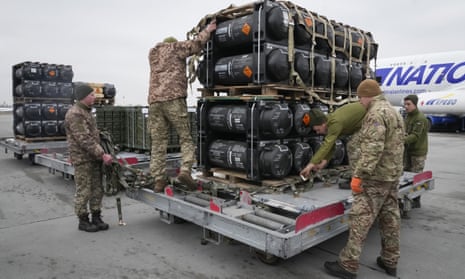 Ukrainian soldiers unpack US Javelin anti-tank missiles in Kyiv