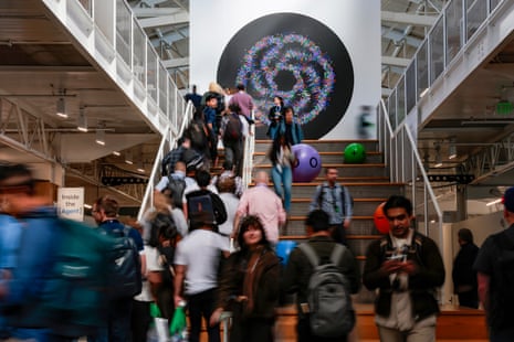 people walk in a convention space