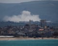 Smoke rises following an Israeli strike at Qlaileh, seen from Tyre, Lebanon, on 14 April.