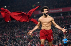 Mohamed Salah celebrates after scoring their second goal late on. Liverpool are now 10 wins from the title.