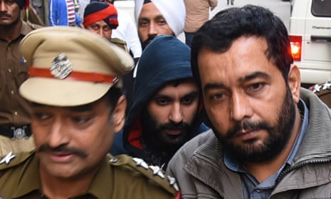 Jagtar Singh Johal being escorted to a court in Punjab state