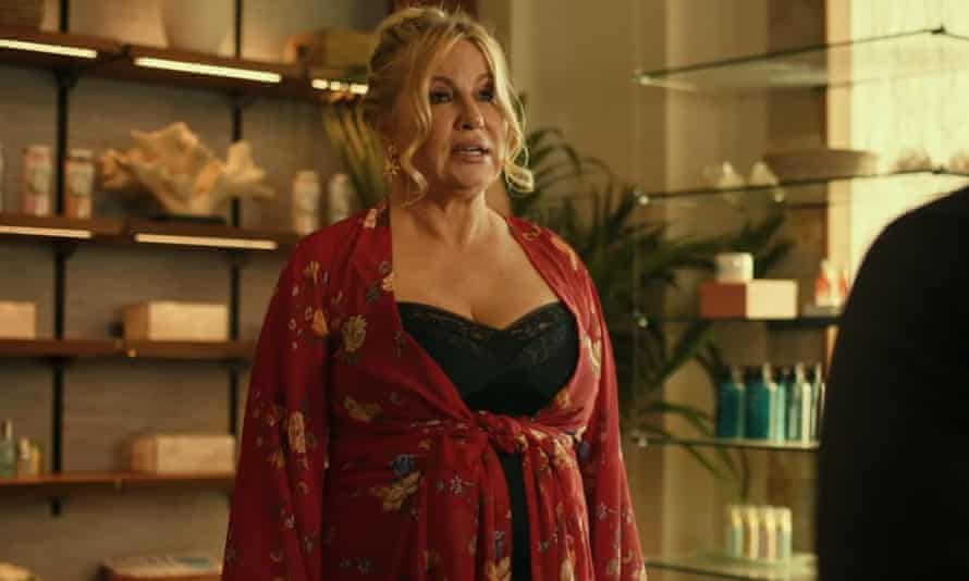 Jennifer Coolidge as Tanya, in a dressing gown