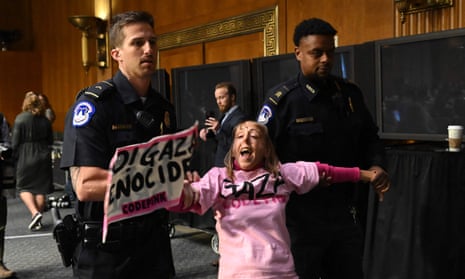 Capitol police removing a protester.