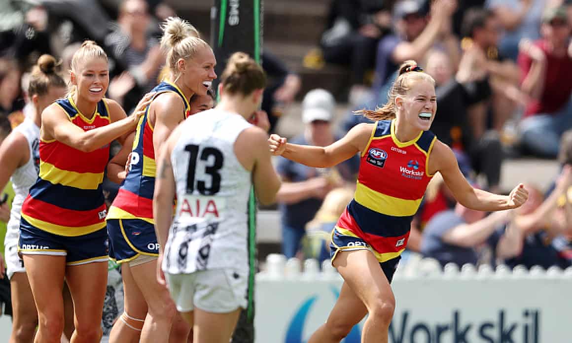 Teah Charlton of the Crows celebrates a goal