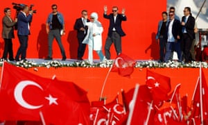 Turkish president Recep Erdoğan and his wife, Emine, attend a rally in Istanbul.
