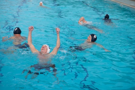 Phil Daoust and John Starbrook play water polo. Hampton. London. 