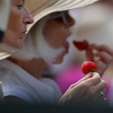 Eating strawberries on Centre Court.