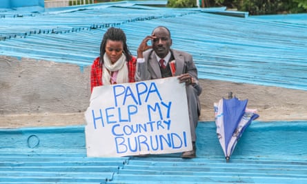 Burundians hold a sign during Pope Francis’s visit to Nairobi, Kenya, in November.