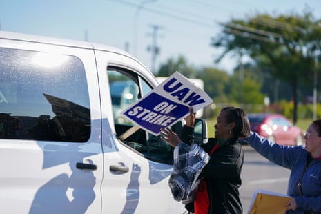 Members of the United Auto Workers union (UAW) gather in front of the Ford Michigan Assembly Plant during the first day of a strike called in response to failed contract negotiations with the Big Three automakers - General Motors, Ford, and Stellantis, the parent company of Jeep and Chrysler - in Detroit, Michigan, USA, 15 September 2023.