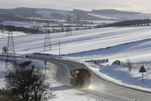 A gritter lorry on the A68 in the Scottish Borders. Police have advised motorists to drive with extreme caution amid wintry conditions.