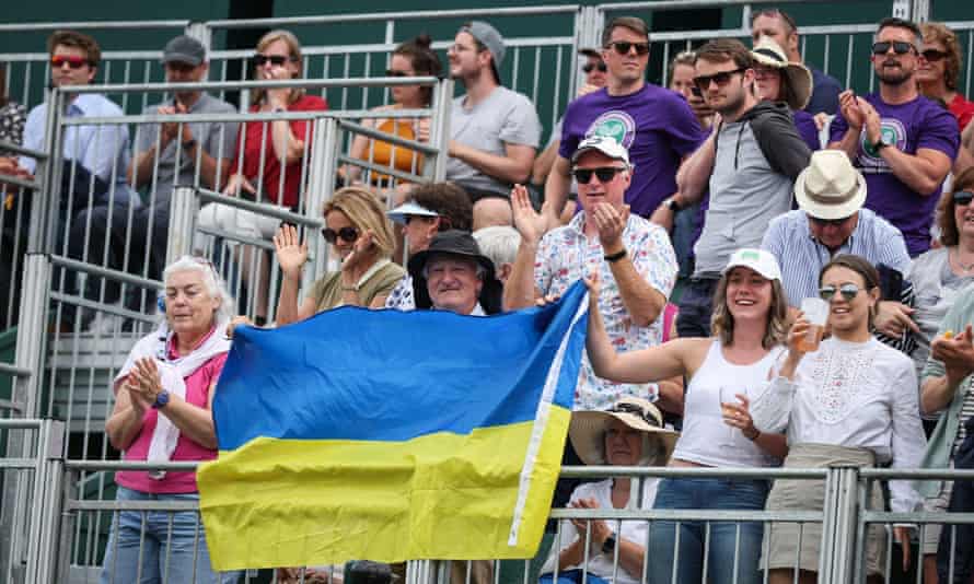 The crowd showed their support for the players with Ukrainian flags.
