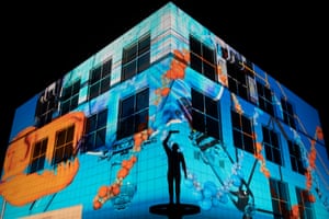Enlighten Festival Canberra-26 February - 8 March. Questacon This year the walls of Questacon contain a science themed animation full of colour and light. Sunday 28th February 2021. Photograph by Mike Bowers. Guardian Australia