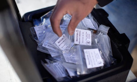 Community members from the Coalition of Peers Dismantling the Drug War hand out clean, tested doses of drugs in Vancouver, British Columbia.
