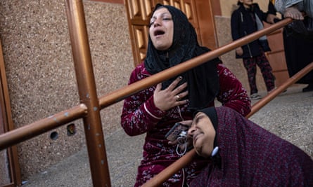 People mourning their relatives killed by the Israeli bombardment in Khan Younis on Saturday.