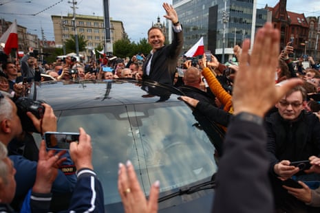 Karol Nawrocki, presidential candidate supported by the Law and Justice party, greets supporters during a campaign rally in Katowice yesterday.