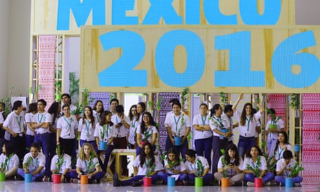 Mexican youth volunteers preparing to plant trees at the UN Biodiversity Conference in Cancun, Mexico on 7 December
