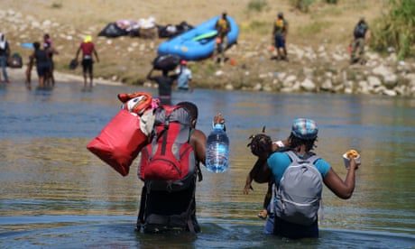 Haitians cross the Rio Grande back to the United States in Parque Ecologico Braulio Fernandez in Ciudad Acuna, Mexico.