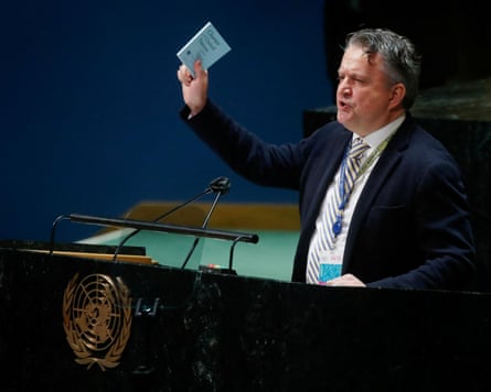 Sergiy Kyslytsia holds the UN charter as he addresses an emergency special session of the general assembly on Russia’s invasion in March 2022.