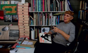 Its horrifically unimaginative that we should still be living with the same Coca-Cola logo Garland in his studio