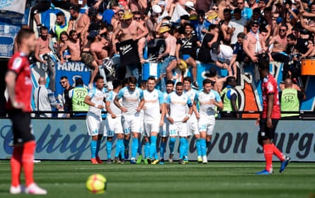 Marseille players celebrate during their 3-1 win at Guingamp this weekend.