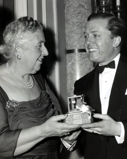 You done it … Richard Attenborough presents Agatha Christie with an award to mark the longevity of her play.