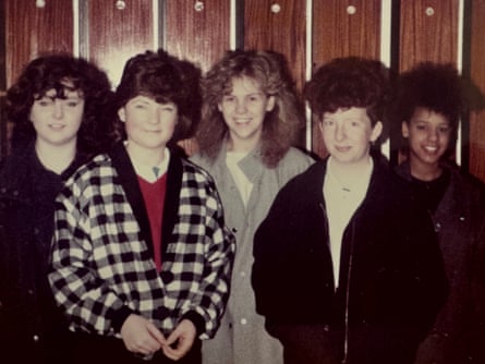 She is flanked by 4 female schoolfriends
