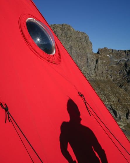 The outside of the bivouac with a person’s shadow visible