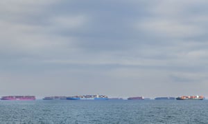 Cargo ships filled with containers wait offshore for entry to the Port of Los Angeles on October 6, 2021 in Los Angeles, California as supply chain disruptions continue to affect the US economy.
