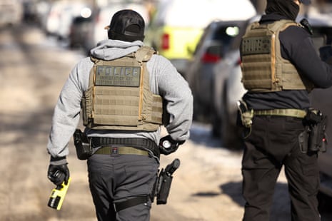 Federal agents are seen during an anti-immigration raid in Minneapolis, Minnesota on February 3, 2026.