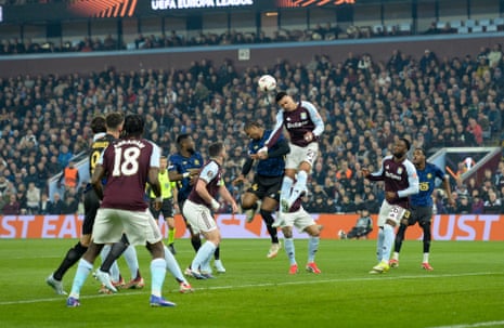 Morgan Rogers heads clear for Villa.