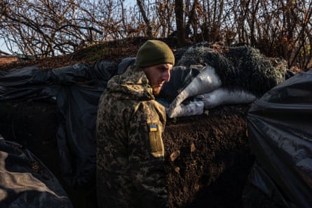 A member of the 63rd Brigade in a frontline position just outside Snihurivka.