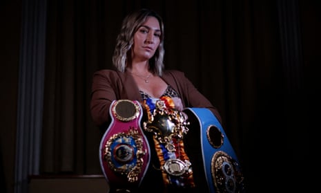 Mikaela Mayer with her world title belts