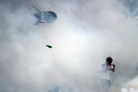 An England fan surrounded by teargas in Marseille