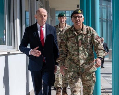 British defence secretary John Healey is greeted by a member of the Cypriot Armed Forces at the Ministry of Defence in Nicosia, Cyprus.