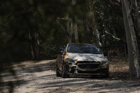 A burntout vehicle is seen on a property at Alexandra in Victoria