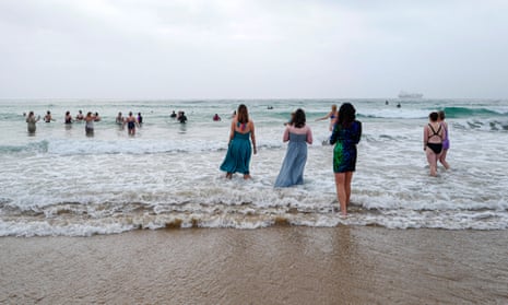 Women entering the sea