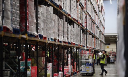 Groceries are prepared for distribution at a Tesco distribution plant in Reading, England.