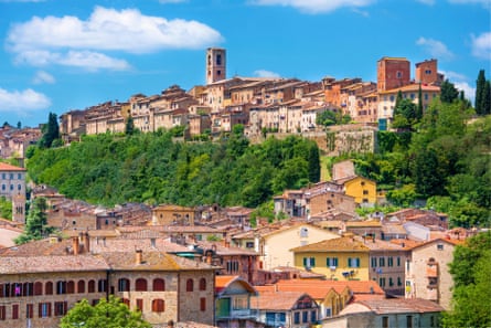 Pretty Italian medieval hilltop town in sunshine