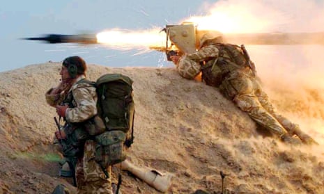 A British Royal Marine fires a missile at an Iraqi position on the al-Faw peninsula in 2003