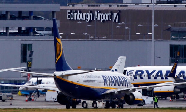 An aircraft is moved from its bay at Edinburgh Airport in Scotland.