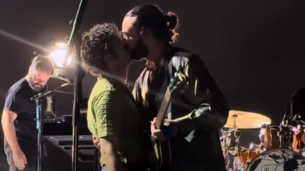 Matty Healy of the band 1975 kisses bandmate Ross MacDonald onstage in Kuala Lumpa, Malaysia.