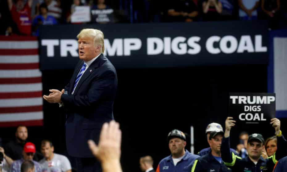 Trump at a rally in Charleston, West Virginia, in 2018. Republican disdain for climate science was embodied by Trump, who famously called it a ‘hoax’.