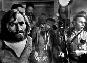 Charles Manson, left, after his arrest on murder charges in 1969.