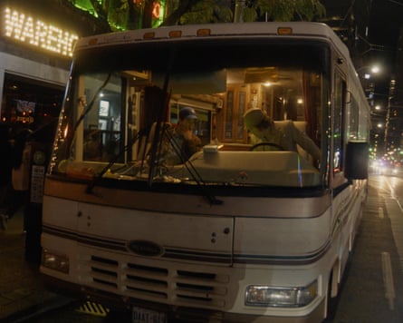 Jay McCarrol and Matt Johnson sitting in a van on a street at night