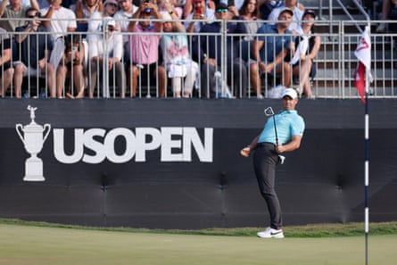 Rory McIlroy reacts to his putt on the 17th green.