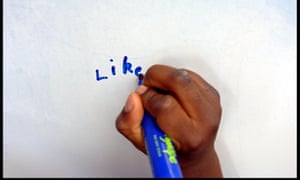 A child practises writing.