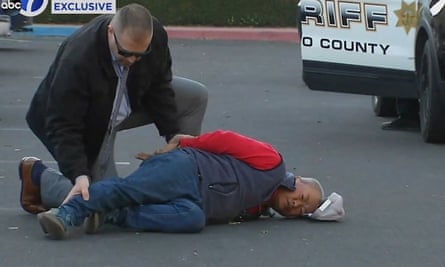 A suspect is arrested by law enforcement personnel after a mass shooting in Half Moon Bay.