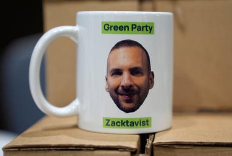A Green party 'Zacktavist' mug on display at the party’s conference in Bournemouth, showing the face of the leader, Zack Polanski.