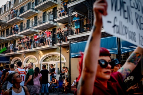 Protesters dressed like characters from the novel The Handmaid’s Tale march down Bourbon Street in New Orleans, Louisiana, on 25 May 2019 to protest a proposed bill that would ban abortion after six weeks.