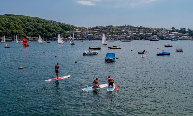Kayaks, drones, now paddleboards: the ‘silent’ sports that threaten seals Paddleboarding on the River Fowey in Cornwall. Photograph: Malcolm McHugh/Alamy